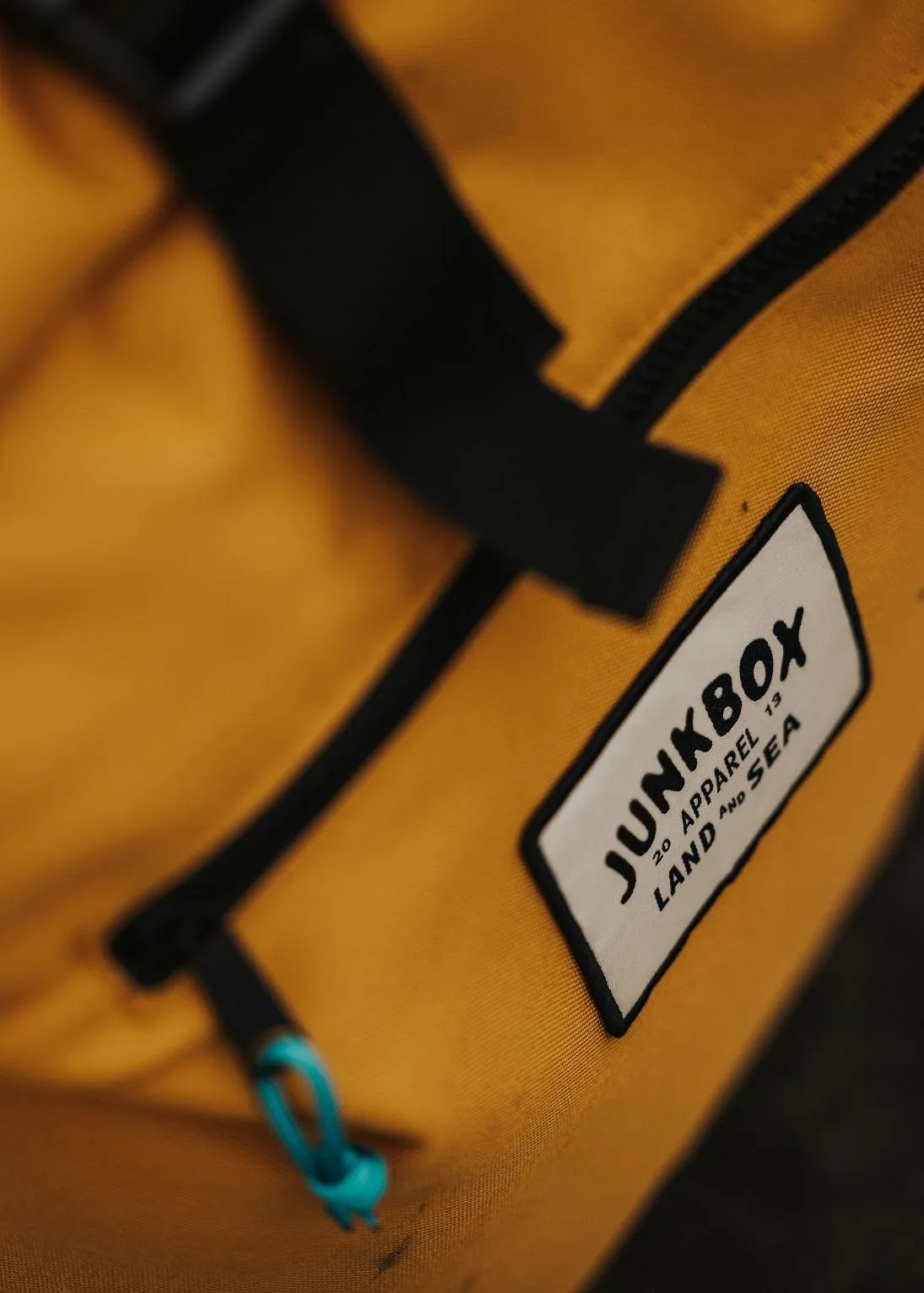 'The Adventurer' Recycled Roll-Top Backpack in Mustard